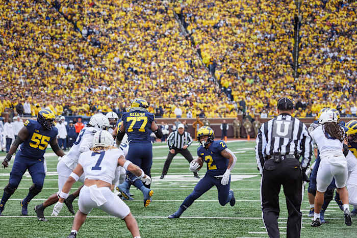 Michigan’s Blake Corum rushes the ball vs. Penn State